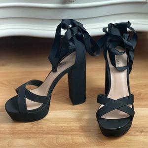 Brand new black block heels. Size 7.5.